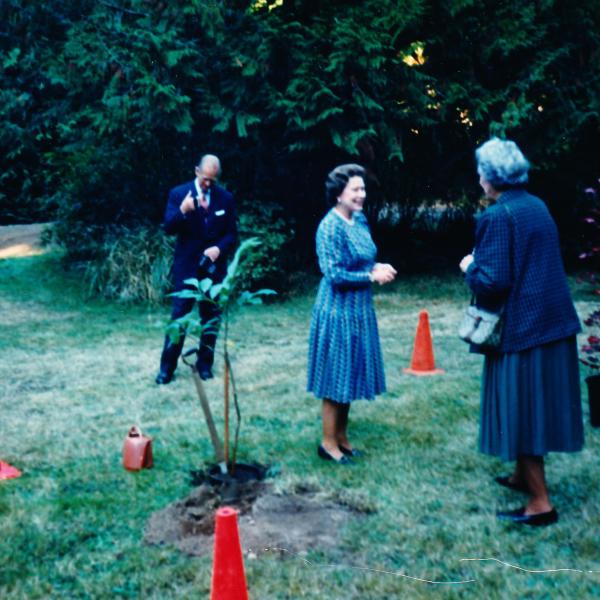 Queen Elizabeth and Prince Philip planting trees 