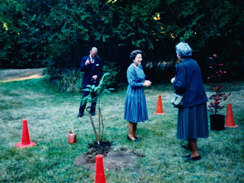Queen Elizabeth and Prince Philip planting trees 